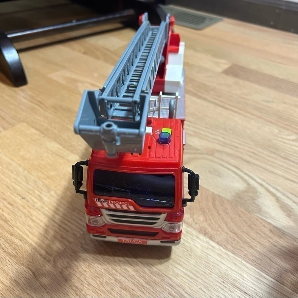 Fire Truck Toy Makes Noise Sirens Movable Ladder Extending Red Kids